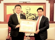 JICA Chief Representative honored with insignia